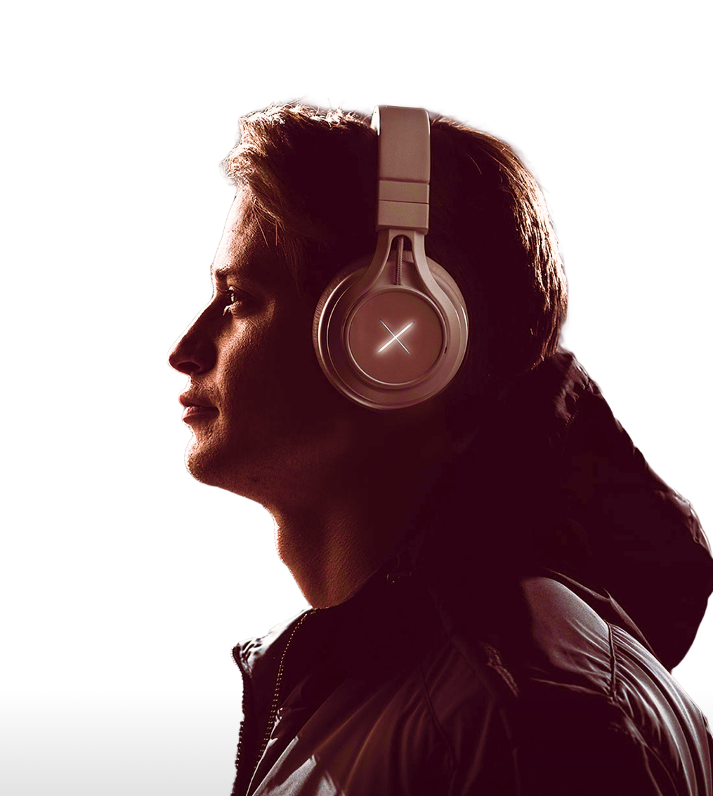 hero image of a guy looking left with headphones on